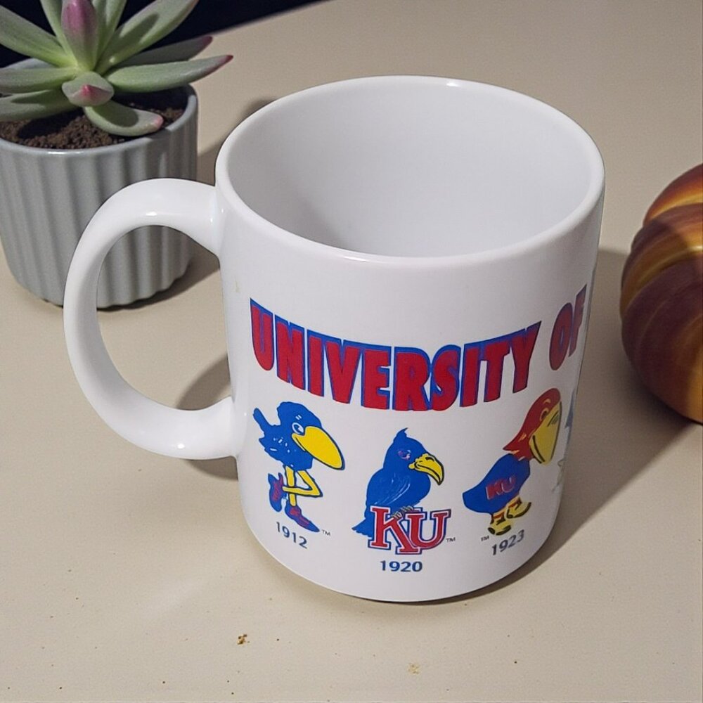 💙❤️ University of Kansas Jayhawks 12 oz Ceramic Mug | Evolution of the Jayhawk
